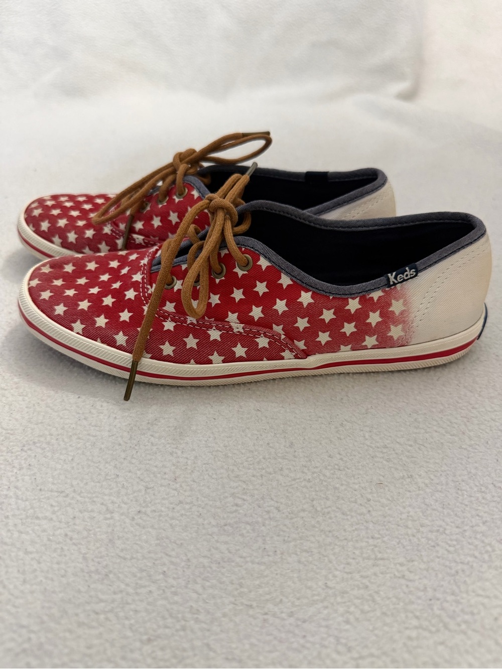 Keds Woman’s Red, White, and Blue Star Canvas Sneakers with Brown Laces